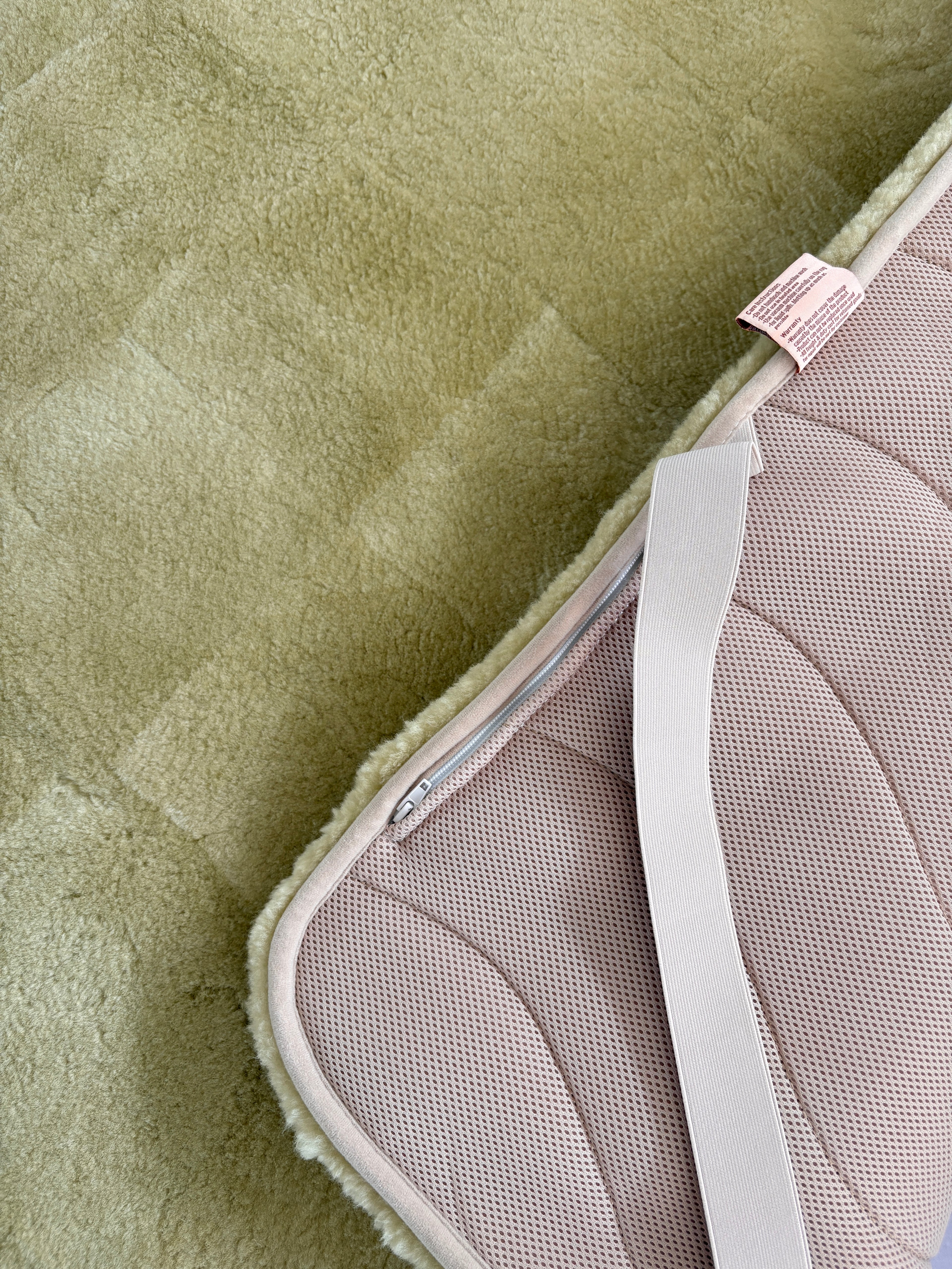 Australian Merino sheepskin rug in Eucalyptus_Folded_close_up