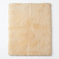 Cream beige underlay and floor rug